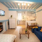 Blue Appartment With A Fireplace
