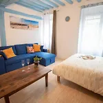 Blue Appartment With A Fireplace