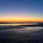 Les Pieds Dans Le Sable