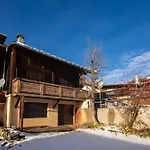 Le Chalet Au Tour Ski In-Ski Out - Happy Rentals