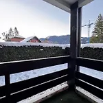 Apartment With Balconies On The Snow Front
